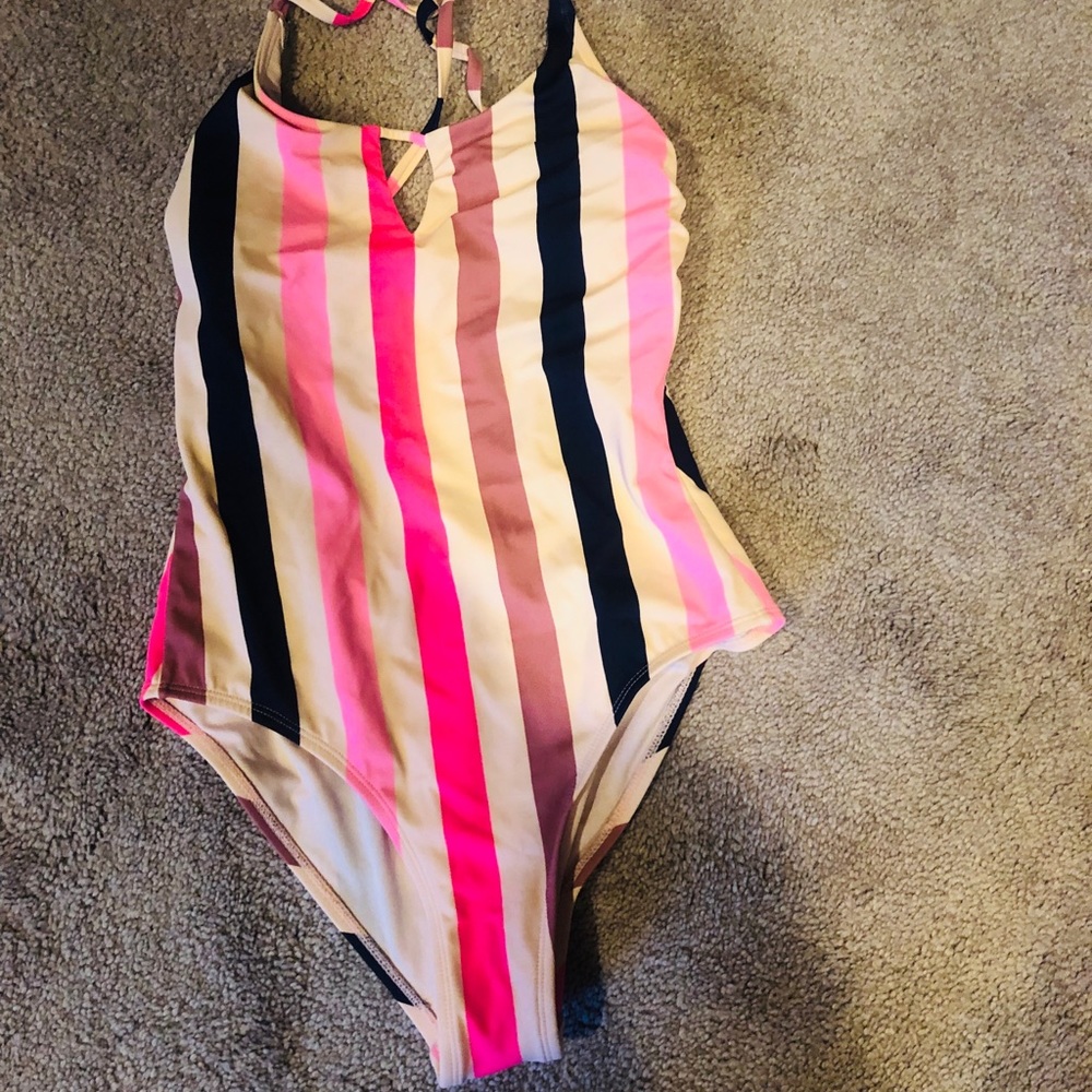 Young misses one piece swim suit